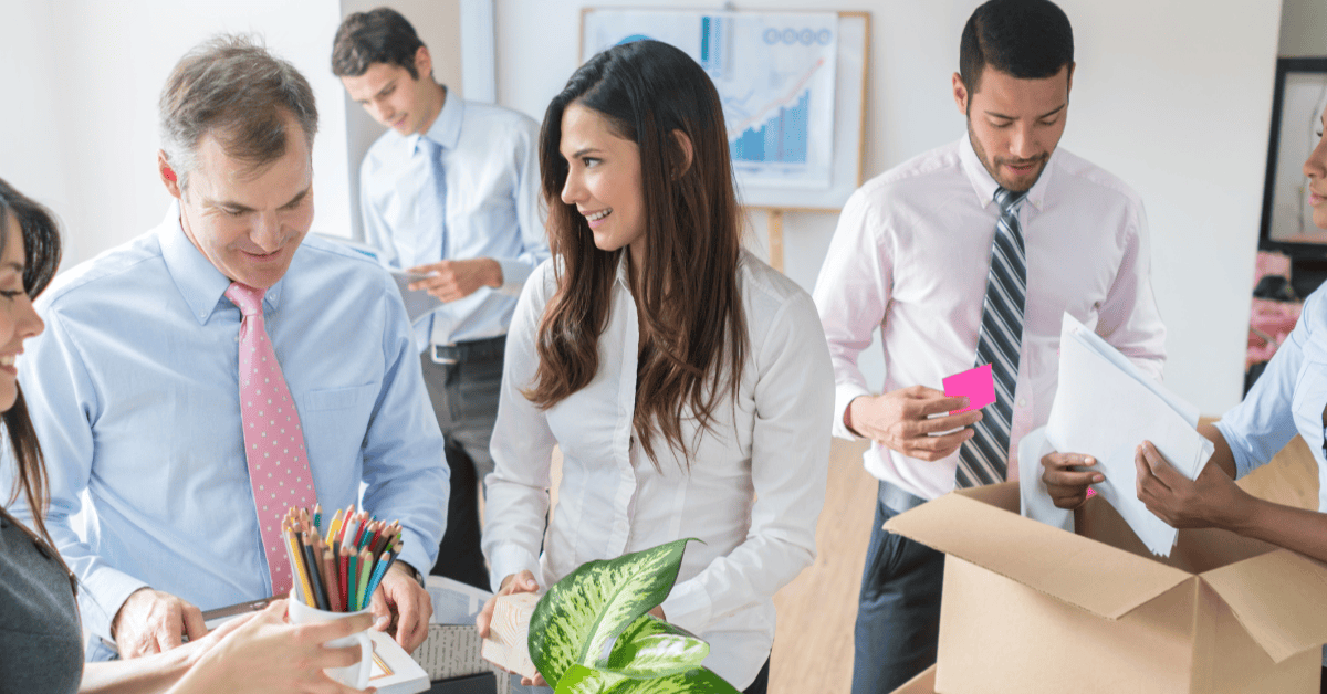 Office staff gather supplies for office move